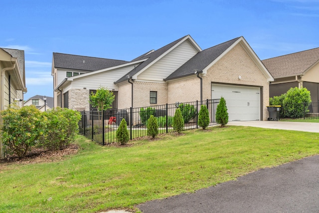 9257 Skyfall Dr, Ooltewah, TN 37363 - view of front of home featuring an attached garage, driveway, and brick siding
