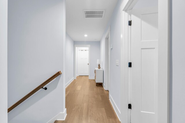 9257 Skyfall Dr, Ooltewah, TN 37363 - corridor with light wood finished floors, an upstairs landing, baseboards, and recessed lighting