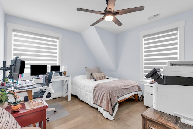 9257 Skyfall Dr, Ooltewah, TN 37363 - bedroom featuring light wood-type flooring, an office area, and ceiling fan