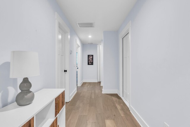 9257 Skyfall Dr, Ooltewah, TN 37363 - corridor with light wood-type flooring, baseboards, and recessed lighting