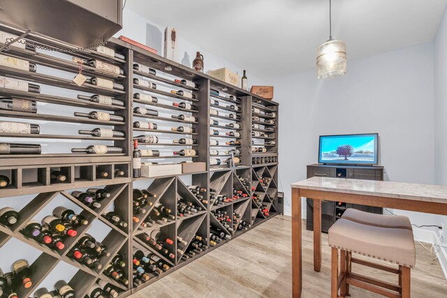9257 Skyfall Dr, Ooltewah, TN 37363 - wine area featuring wood finished floors