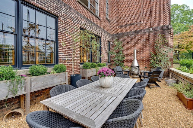 1000 E Martin Luther King Blvd Unit 102, Chattanooga, TN 37403 - view of patio featuring outdoor dining space