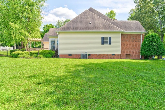 81 Arnold Rd, Rock Spring, GA 30739 - rear view of house featuring crawl space, a pergola, central AC unit, and roof with shingles