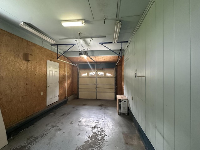 361 Gracie Ave, Ringgold, GA 30736 - garage with a garage door opener and wood walls