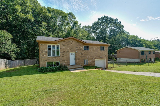 1373 Meadowood Dr, Hixson, TN 37343 - view of front of property featuring concrete driveway, brick siding, and a garage