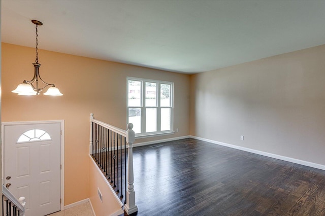 1373 Meadowood Dr, Hixson, TN 37343 - entryway featuring a chandelier, dark wood-style flooring, and baseboards