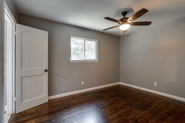 1373 Meadowood Dr, Hixson, TN 37343 - empty room featuring ceiling fan, dark wood-type flooring, and baseboards