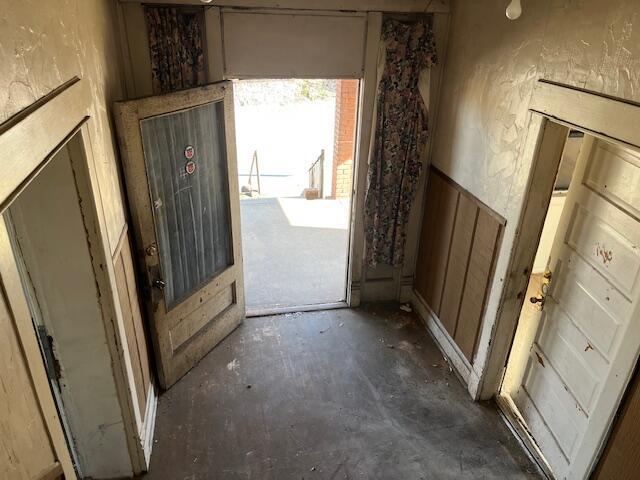 1908 Mccallie Ave, Chattanooga, TN 37404 - doorway to outside featuring concrete flooring