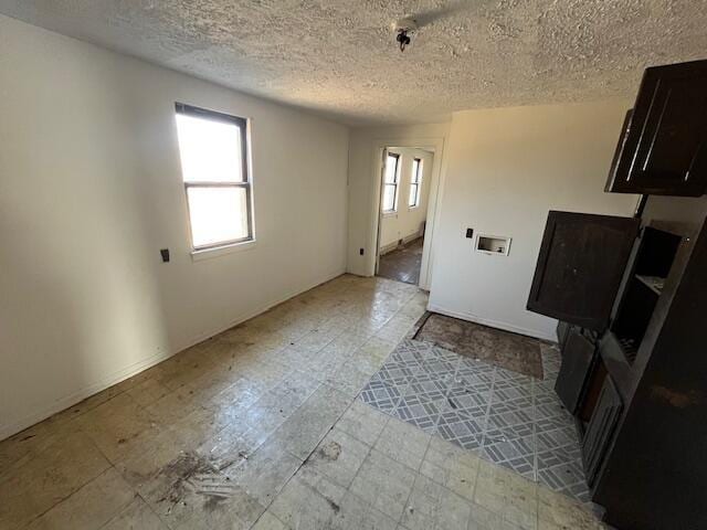 1908 Mccallie Ave, Chattanooga, TN 37404 - unfurnished living room with a textured ceiling