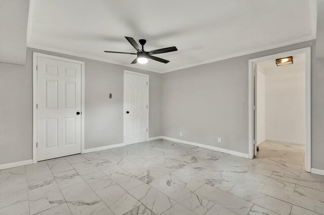 1204 Greenwood Rd, Chattanooga, TN 37411 - unfurnished bedroom featuring baseboards, marble look tile flooring, crown molding, and ceiling fan