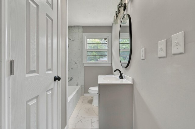 1204 Greenwood Rd, Chattanooga, TN 37411 - full bathroom with marble look tiles, toilet, vanity, washtub / shower combination, and baseboards