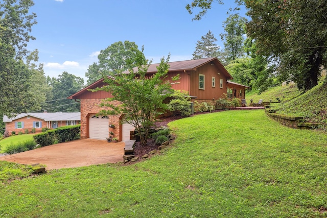 787 Flinn Dr, Chattanooga, TN 37412 - view of home's exterior with concrete driveway and a lawn