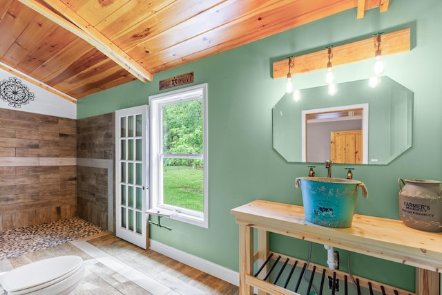 7815 Parkshore Cir, Hixson, TN 37343 - bathroom featuring tiled shower, wood ceiling, lofted ceiling, and wood finished floors