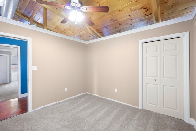 7815 Parkshore Cir, Hixson, TN 37343 - unfurnished bedroom featuring wooden ceiling, carpet flooring, a closet, ornamental molding, and ceiling fan