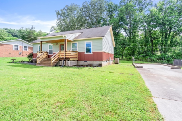 7815 Parkshore Cir, Hixson, TN 37343 - view of front facade featuring crawl space, a porch, driveway, stairs, and a front yard