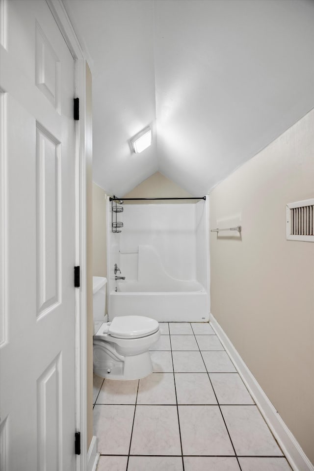 310 Bluffs Rd N, South Pittsburg, TN 37380 - bathroom with toilet, lofted ceiling, tile patterned flooring,  shower combination, and baseboards