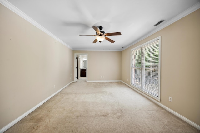 310 Bluffs Rd N, South Pittsburg, TN 37380 - spare room featuring ceiling fan, light carpet, ornamental molding, and baseboards