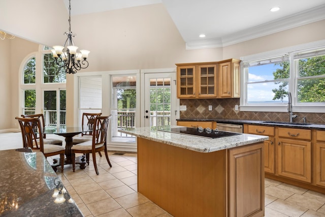 310 Bluffs Rd N, South Pittsburg, TN 37380 - kitchen featuring a sink, black electric cooktop, light tile patterned floors, french doors, and decorative backsplash