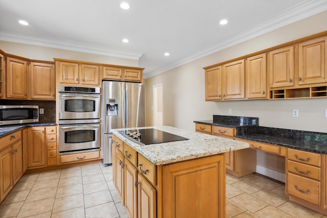 310 Bluffs Rd N, South Pittsburg, TN 37380 - kitchen with stainless steel appliances, a center island, ornamental molding, light tile patterned floors, and dark stone countertops