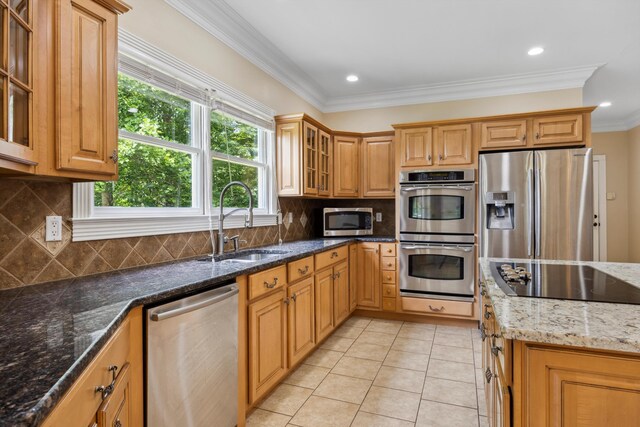 310 Bluffs Rd N, South Pittsburg, TN 37380 - kitchen featuring stainless steel appliances, a sink, light tile patterned flooring, dark stone counters, and glass insert cabinets
