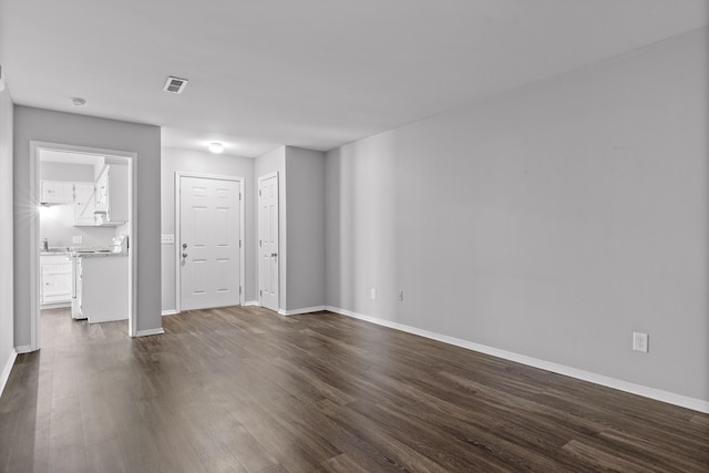 32 S Germantown Rd, Chattanooga, TN 37411 - empty room featuring dark wood-style flooring and baseboards