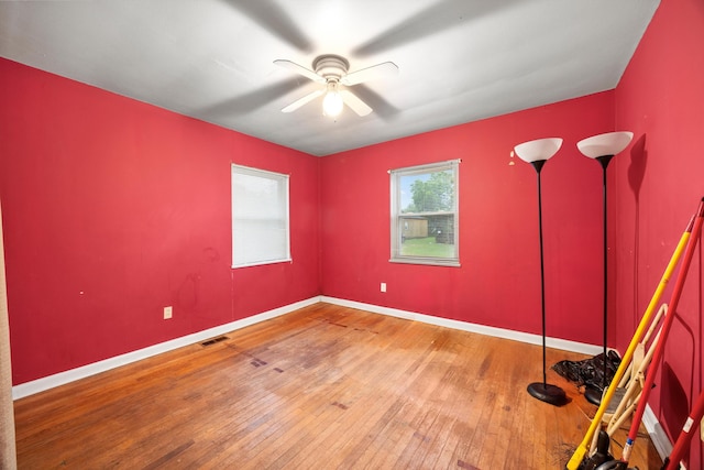 2524 Spring Place Rd SE, Cleveland, TN 37323 - unfurnished room featuring hardwood / wood-style flooring, a ceiling fan, and baseboards