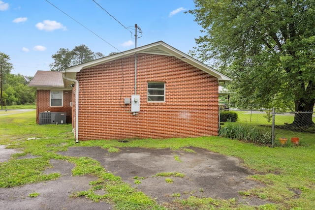 2524 Spring Place Rd SE, Cleveland, TN 37323 - view of property exterior with central air condition unit and brick siding
