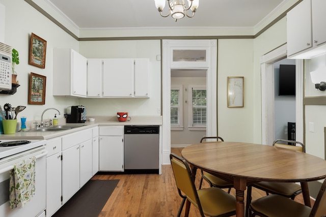 602 Oliver St, Chattanooga, TN 37405 - kitchen with dishwasher, electric stove, crown molding, light wood-style flooring, and light countertops