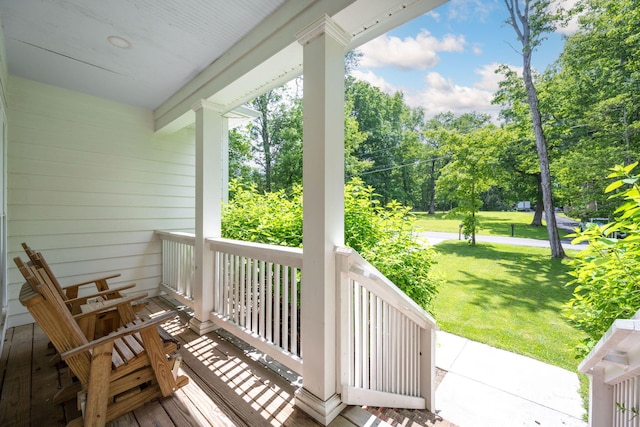 2024 Oak St, Signal Mountain, TN 37377 - covered porch featuring a lawn and view of scattered trees