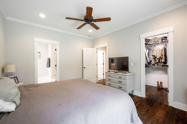 2024 Oak St, Signal Mountain, TN 37377 - bedroom with dark wood finished floors, ornamental molding, a spacious closet, recessed lighting, and a closet