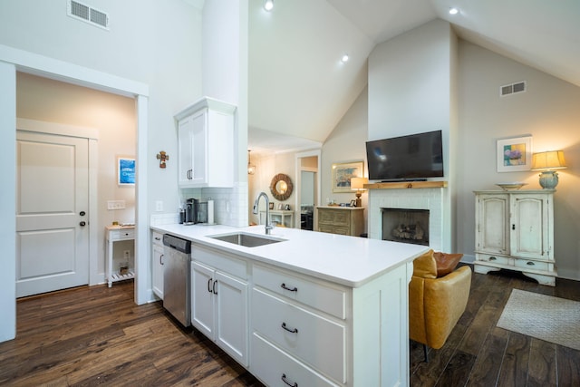 2024 Oak St, Signal Mountain, TN 37377 - kitchen with dishwasher, high vaulted ceiling, dark wood-type flooring, open floor plan, and a peninsula