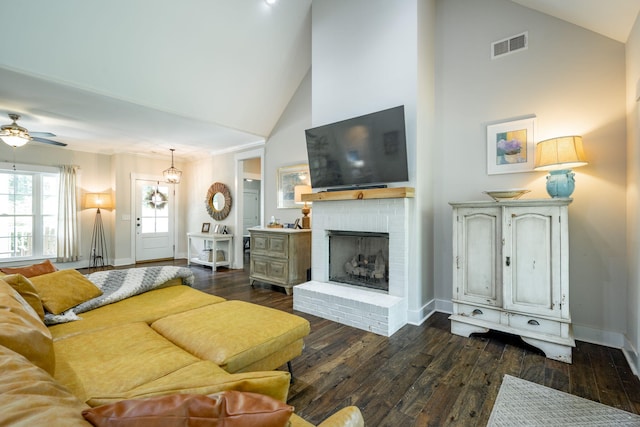 2024 Oak St, Signal Mountain, TN 37377 - living room with high vaulted ceiling, dark wood-type flooring, a brick fireplace, and a ceiling fan