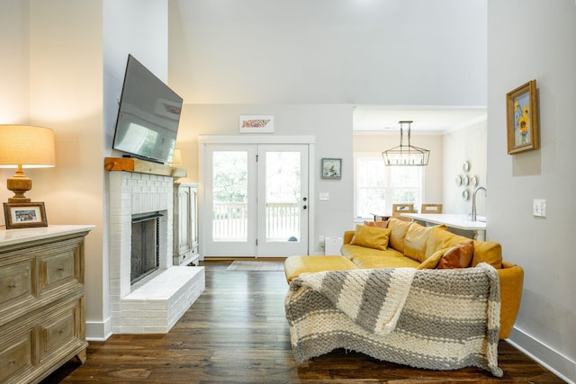2024 Oak St, Signal Mountain, TN 37377 - living area featuring a brick fireplace and dark wood-style flooring
