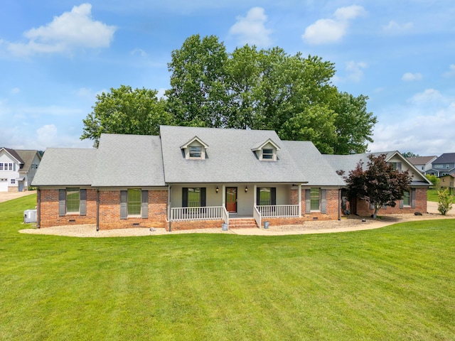 2195 Ooltewah Ringgold Rd, Ooltewah, TN 37363 - cape cod-style house with a porch, brick siding, and a front lawn