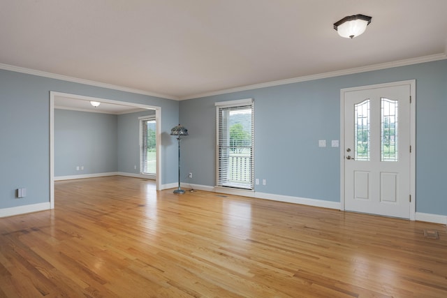 2195 Ooltewah Ringgold Rd, Ooltewah, TN 37363 - unfurnished living room with crown molding and light wood-type flooring