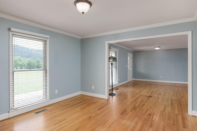 2195 Ooltewah Ringgold Rd, Ooltewah, TN 37363 - unfurnished room featuring ornamental molding and light wood-style floors