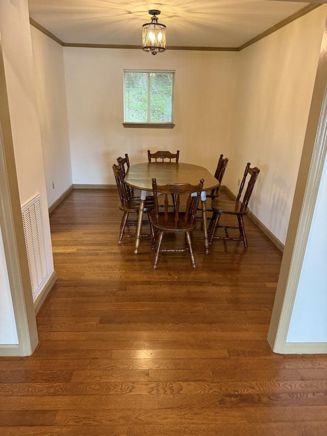 11640 Hixson Pike, Soddy Daisy, TN 37379 - dining area with ornamental molding, wood finished floors, and baseboards