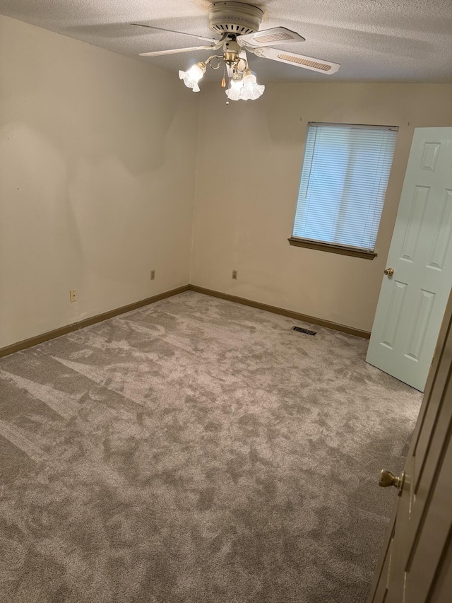 11640 Hixson Pike, Soddy Daisy, TN 37379 - carpeted empty room featuring ceiling fan, a textured ceiling, and baseboards