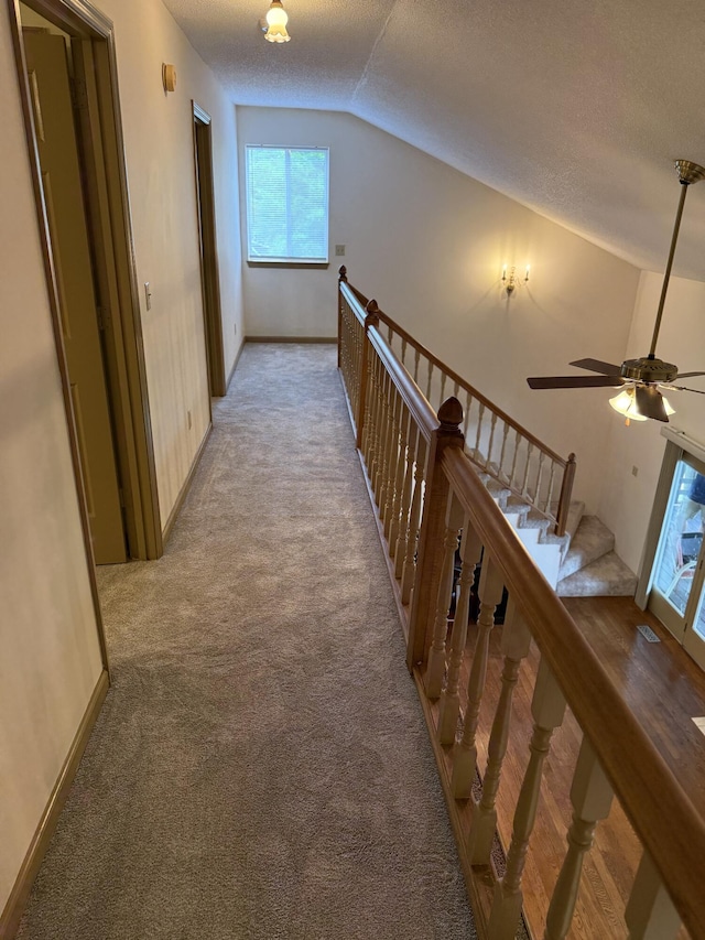 11640 Hixson Pike, Soddy Daisy, TN 37379 - corridor featuring vaulted ceiling, light carpet, a textured ceiling, and baseboards