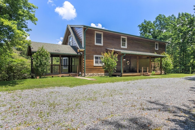 7524 Banther Rd, Harrison, TN 37341 - back of property featuring covered porch and a lawn