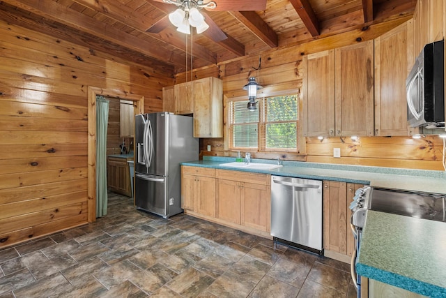7524 Banther Rd, Harrison, TN 37341 - kitchen with stainless steel appliances, a wood ceiling with exposed beams, wood walls, ceiling fan, and dark stone finish flooring
