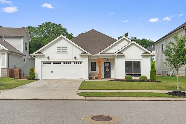 3620 Weathervane, Apison, TN 37302 - modern inspired farmhouse with board and batten siding, driveway, an attached garage, a front yard, and roof with shingles