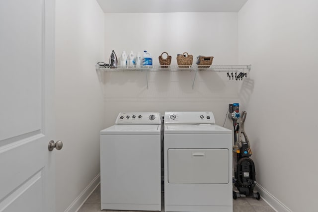 3620 Weathervane, Apison, TN 37302 - laundry area with washer and dryer and light tile patterned floors