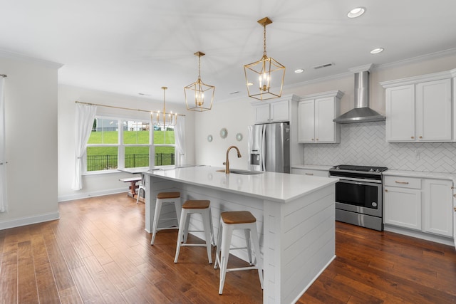3620 Weathervane, Apison, TN 37302 - kitchen featuring stainless steel appliances, wall chimney range hood, light countertops, a chandelier, and a kitchen island with sink
