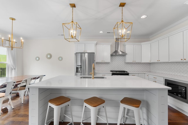 3620 Weathervane, Apison, TN 37302 - kitchen with a chandelier, stainless steel appliances, wall chimney exhaust hood, crown molding, and decorative backsplash