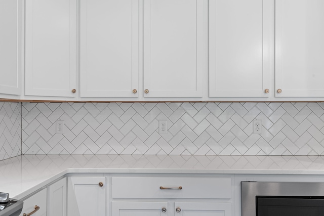 3620 Weathervane, Apison, TN 37302 - kitchen with light countertops, white cabinetry, backsplash, and beverage cooler
