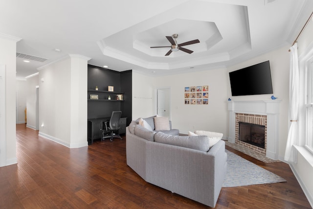 3620 Weathervane, Apison, TN 37302 - living area featuring a ceiling fan, ornamental molding, a desk, a brick fireplace, and dark wood-type flooring