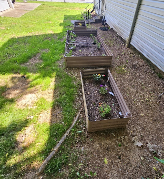 503 S Lovell Ave, Chattanooga, TN 37412 - view of grassy yard featuring a vegetable garden