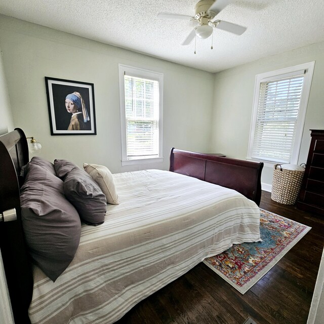 503 S Lovell Ave, Chattanooga, TN 37412 - bedroom featuring wood finished floors, a textured ceiling, and a ceiling fan