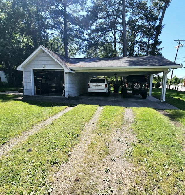 503 S Lovell Ave, Chattanooga, TN 37412 - view of parking with dirt driveway and an attached carport
